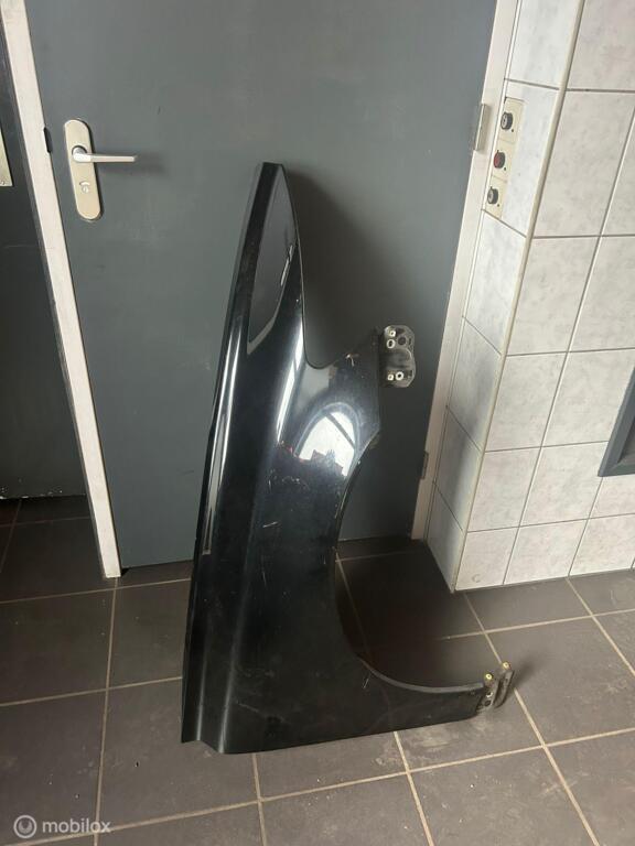 Zijscherm rechts zwart Volvo V50 ('04-'12), Auto-onderdelen, Carrosserie en Plaatwerk, Volvo, Gebruikt, Ophalen of Verzenden