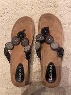 Lazamani slippers, Ophalen, Zo goed als nieuw
