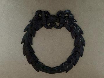 Gietijzeren krans beschikbaar voor biedingen