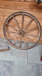 Oude Karrewiel als Decoratie, Ophalen