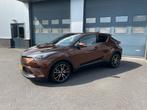 Toyota C-HR 1.8 Hybrid 122pk CVT 2017 Bruin, Auto's, Toyota, 4 cilinders, Bruin, Leder en Stof, 98 pk