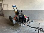 Stobbenfrees met aanhangwagen, Ophalen