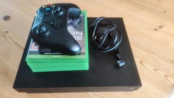 Xbox One X met controller + 4 Games beschikbaar voor biedingen