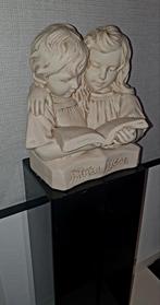 Buste lezende kinderen jongen en meisje, Ophalen