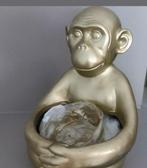 Aap met bloempot, Ophalen