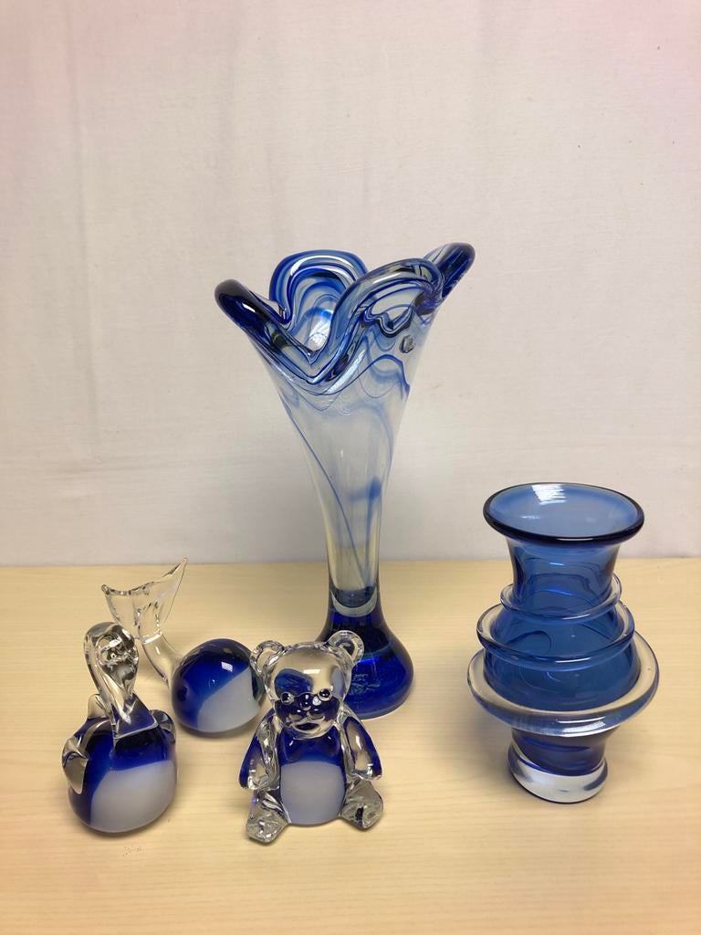 Vaasjes en beeldjes blauw, Ophalen