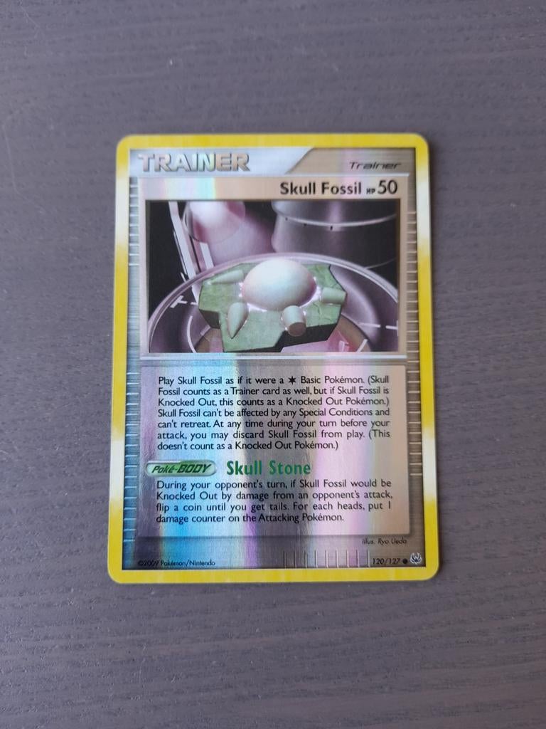 2009 platinum 120/127 skull fossil reverse, Ophalen of Verzenden, Gebruikt, Losse kaart, Foil