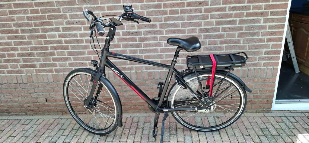 E-bike mooie heren en dames stella fiets., Velgrem, Versnellingen, Zo goed als nieuw, 53 tot 57 cm