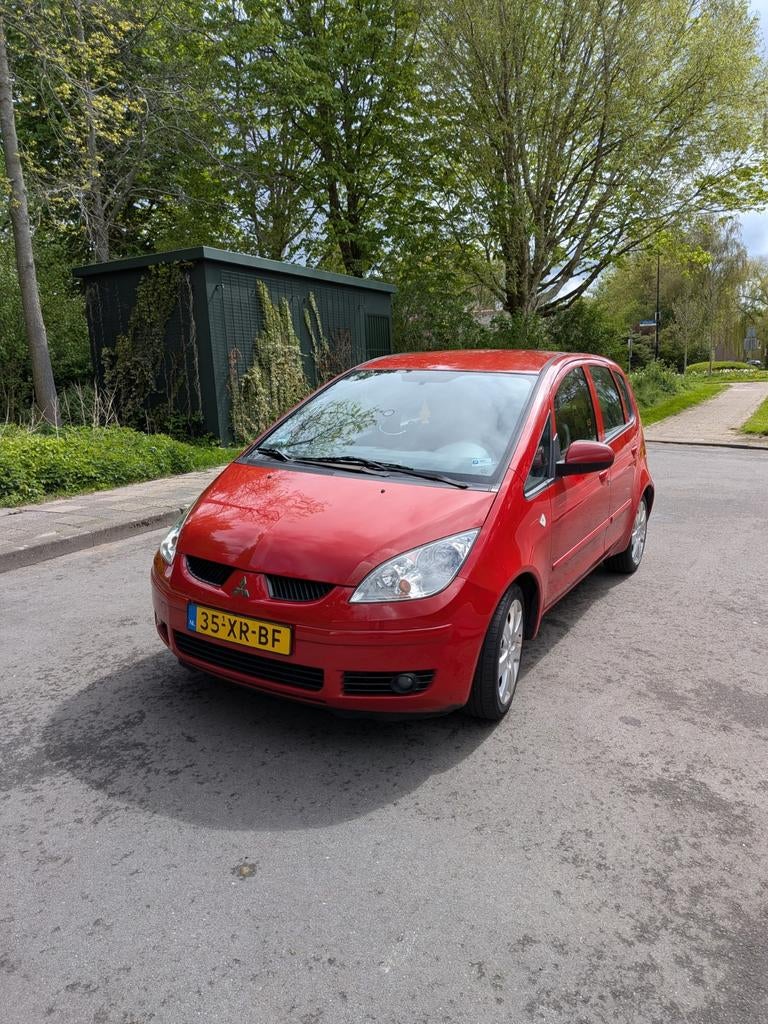 Mitsubishi Colt 1.5 CZ5 Rood 2007 Stoelverwarming lage km, Auto's, Mitsubishi, Voorwielaandrijving, 40 €/maand, Zwart, 4 cilinders