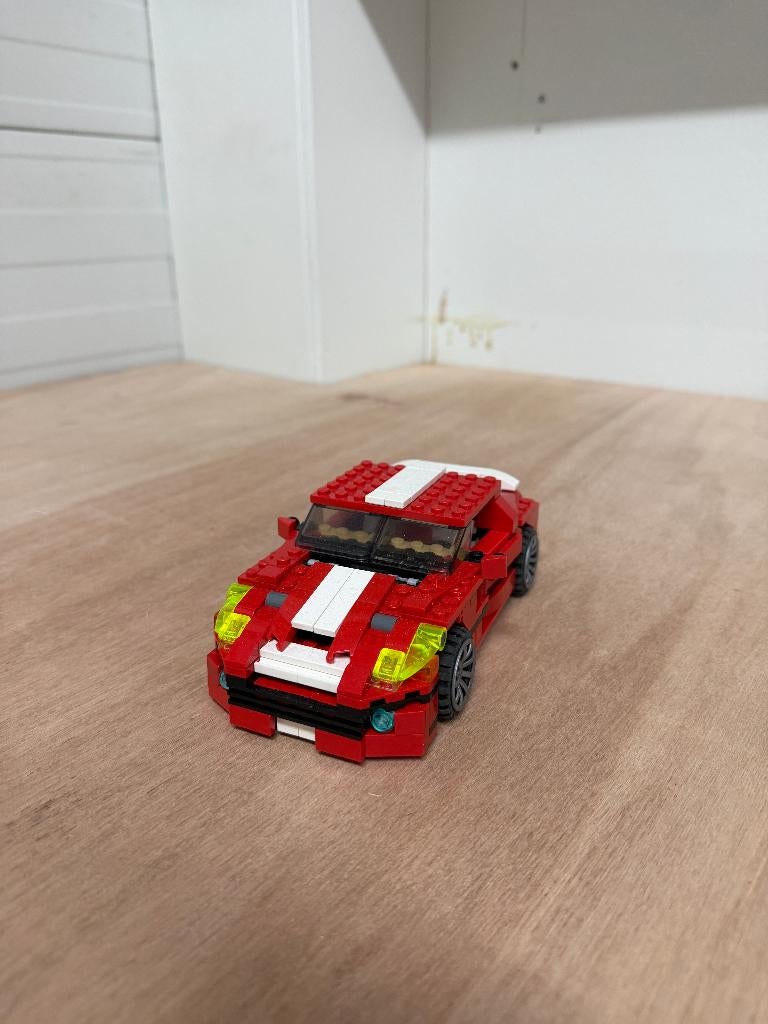 LEGO Rood Witte Sportauto (Machtige Motoren), Lego, Community@lego.com, Ophalen of Verzenden, Zo goed als nieuw