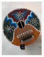 Mooi muziek instrument gemaakt halve kokosnoot kleuren 14 cm, Ophalen of Verzenden