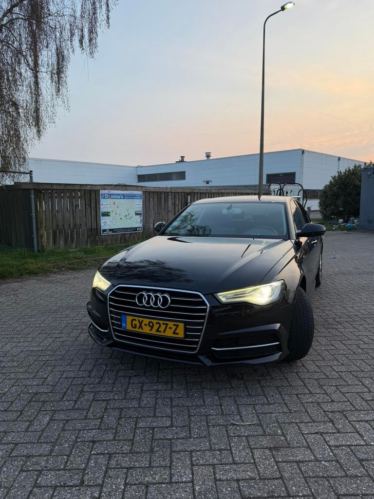 Audi A6 2.0 TDI 140KW Ultra S-tronic 2015 Zwart, Auto's, Audi, 1800 kg, 4 cilinders, Zwart, 24 km/l