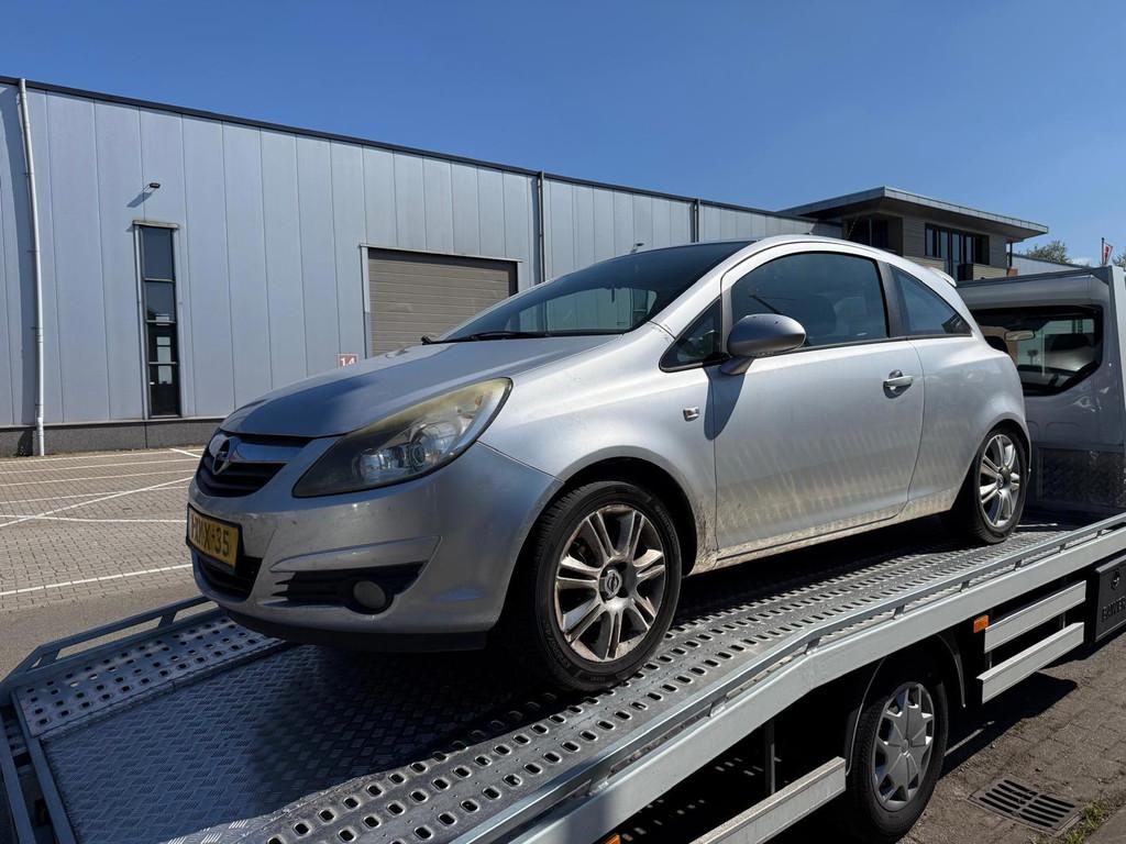 Opel Corsa 1.4-16V Cosmo AUTOMAAT APK (advertentie lezen), Auto's, Opel, 15 km/l, Gebruikt, Zwart, 4 cilinders