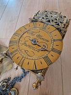 Klassieke klok goud, Ophalen